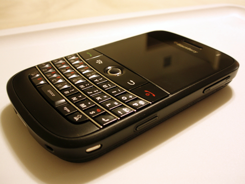 Here are a couple of photo's of my bold with my new black trackball.